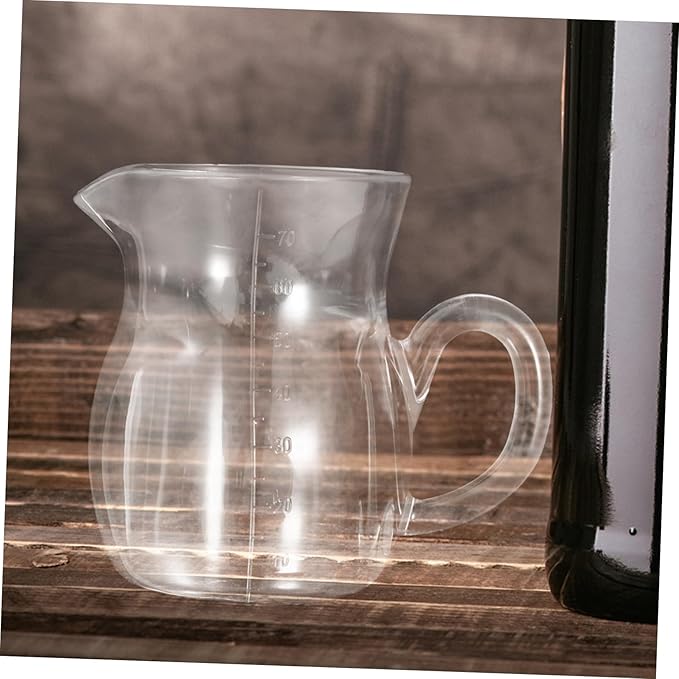 Unomor Handheld Wine Decanter Elegant Transparent Liquor Dispenser with Handle for Red Wine and Spirits Versatile Aerator for Home Restaurant and Bar Use